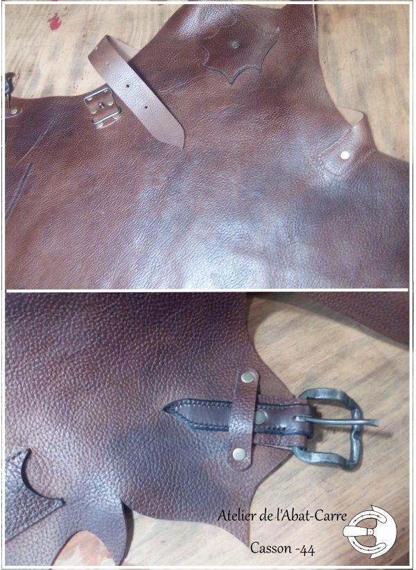 tablier de forgeron : en cuir gras, épais et souple. bouclerie artisanale de forge, motif de découpe rappelant le feu.